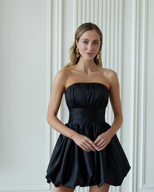 Mini abito nero effetto corsetto in raso lucido